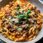 Ground Beef Orzo with Tomato Cream Sauce and Fresh Basil