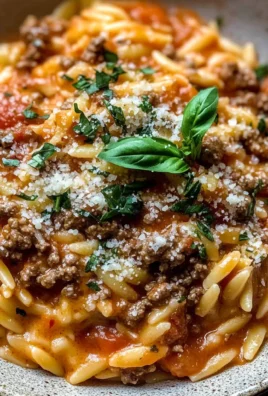 Ground Beef Orzo with Tomato Cream Sauce and Fresh Basil