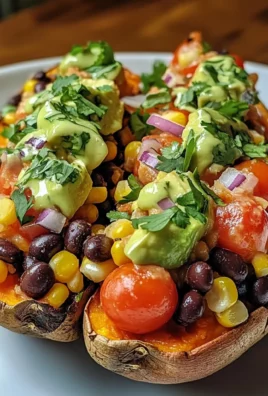 Stuffed Sweet Potato with Avocado, Black Beans & Cilantro Lime Crema