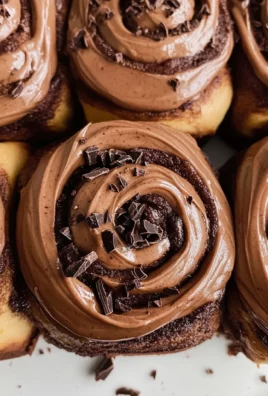 Chocolate cinnamon rolls with chocolate cream cheese frosting