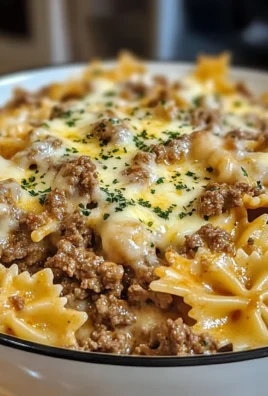 Cajun Garlic Butter Beef with Creamy Cheddar Bowtie Pasta