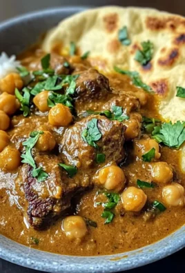 Slow Simmered Coconut Beef and Chickpea Curry with Warm Garlic Naan