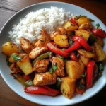 Spicy Chicken Stir-Fry with Bell Peppers, Roast Potatoes & Steamed Rice
