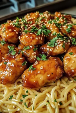 Sticky Honey Garlic Chicken Bites with Buttered Noodles