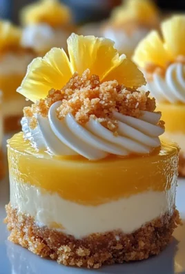 Tropical Swirl Pineapple Cheesecake Bites with Ginger Crumble