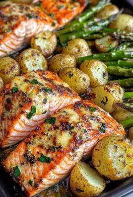 Baked Garlic Salmon with Crispy Baby Potatoes & Cheesy Asparagus